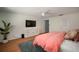Bedroom featuring wood floors, a ceiling fan, and light-colored walls at 7202 18Th Nw Ave, Bradenton, FL 34209