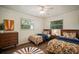 Bedroom featuring two twin beds and an orange-themed decor at 7202 18Th Nw Ave, Bradenton, FL 34209