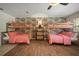Bedroom with bunkbeds with wooden frames and hardwood floors at 7202 18Th Nw Ave, Bradenton, FL 34209