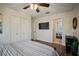 Spacious bedroom featuring wooden floors, double closets, and a television at 7202 18Th Nw Ave, Bradenton, FL 34209