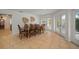 Open dining area with French doors offers a seamless indoor-outdoor living experience at 7202 18Th Nw Ave, Bradenton, FL 34209