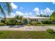 Charming home with well-manicured landscaping and a inviting front facade at 7202 18Th Nw Ave, Bradenton, FL 34209