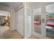 Hallway with neutral walls and door to bedroom at 7202 18Th Nw Ave, Bradenton, FL 34209