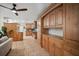 Bright kitchen with custom wood cabinets and tiled floors offer ample space and timeless style at 7202 18Th Nw Ave, Bradenton, FL 34209
