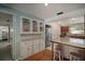 Bright kitchen featuring white cabinets, stainless steel appliances, and a breakfast bar at 7202 18Th Nw Ave, Bradenton, FL 34209