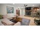 Living room with stone fireplace, hardwood floors, and modern decor at 7202 18Th Nw Ave, Bradenton, FL 34209