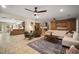 Open-concept living area flows seamlessly into the kitchen with a neutral palette and stylish finishes at 7202 18Th Nw Ave, Bradenton, FL 34209