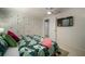 Inviting main bedroom featuring tropical decor, spacious closet and lots of natural light at 7202 18Th Nw Ave, Bradenton, FL 34209