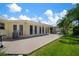 View of a concrete patio with access to the yard through French doors at 7202 18Th Nw Ave, Bradenton, FL 34209