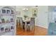 Inviting dining room with wood floors, light-colored walls and a chandelier, ready for memorable gatherings at 7301 29Th Avenue W Dr # 108, Bradenton, FL 34209