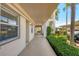 Exterior walkway featuring well-maintained landscaping and building facade at 7301 29Th Avenue W Dr # 108, Bradenton, FL 34209