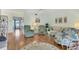 Spacious living room featuring comfortable seating, a rug, and access to other rooms at 7301 29Th Avenue W Dr # 108, Bradenton, FL 34209