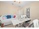 Bedroom with a sewing machine on a table, a daybed and closet organizer at 7844 52Nd E Ter, Bradenton, FL 34203