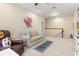 Cozy bonus room featuring comfortable seating, artwork, and a calming atmosphere at 7844 52Nd E Ter, Bradenton, FL 34203