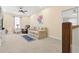 Spacious bonus room featuring neutral carpet, ceiling fan, and comfortable seating at 7844 52Nd E Ter, Bradenton, FL 34203