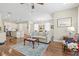 Bright and open living space with an adjacent dining area and well-equipped kitchen at 7844 52Nd E Ter, Bradenton, FL 34203