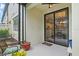 Outdoor patio with chairs and a view of the house at 7844 52Nd E Ter, Bradenton, FL 34203