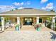 Charming pool pavilion features comfortable seating areas and stylish landscaping at 7844 52Nd E Ter, Bradenton, FL 34203