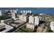 Aerial view showcasing luxury condos with waterfront views and community amenities at 800 N Tamiami Trl # 604, Sarasota, FL 34236