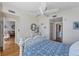Comfortable bedroom featuring hardwood floors and an airy ambiance with open doorways at 800 N Tamiami Trl # 604, Sarasota, FL 34236