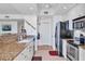 Modern kitchen featuring stainless steel appliances, granite countertops, and an open design for easy entertaining at 800 N Tamiami Trl # 604, Sarasota, FL 34236