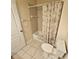 This is a standard bathroom that features a shower/tub combo and tile flooring at 8110 Villa Grande Ct, Sarasota, FL 34243