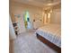 Bright bedroom with neutral tones, carpet, ensuite bathroom and walk-in closet at 8110 Villa Grande Ct, Sarasota, FL 34243