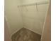 Walk-in closet with wire shelving and carpeted flooring at 8110 Villa Grande Ct, Sarasota, FL 34243