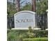Elegant stone entrance sign for the Sonoma community with manicured landscaping at 8110 Villa Grande Ct, Sarasota, FL 34243