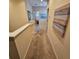 Hallway featuring coastal decor and access to other rooms in the home at 8110 Villa Grande Ct, Sarasota, FL 34243