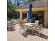 Enjoy the community pool with comfortable lounge seating, tables with umbrellas, and a covered pavilion at 8110 Villa Grande Ct, Sarasota, FL 34243