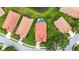 An aerial view of a home with a private pool in the backyard and a well-manicured lawn at 8118 Stirling Falls Cir, Sarasota, FL 34243