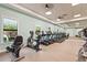 Bright fitness center with treadmills, elliptical machines, and weights for a healthy lifestyle at 8118 Stirling Falls Cir, Sarasota, FL 34243