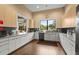 Community kitchen with stainless steel appliances, ample counter space, and modern cabinetry for events and gatherings at 8118 Stirling Falls Cir, Sarasota, FL 34243