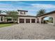 Long driveway leads to a 3-car garage and porte-cochere at 8316 Portlight Ct, Lakewood Ranch, FL 34202