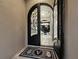 Grand foyer entrance showcasing an elegant doorway, tile flooring and an open floorplan at 8316 Portlight Ct, Lakewood Ranch, FL 34202