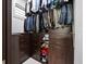 Well-organized walk-in closet with custom drawers, shelving, and hanging space, maximizing storage efficiency at 8316 Portlight Ct, Lakewood Ranch, FL 34202