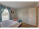 Comfortable bedroom with a bed, window, and curtains at 904 Winter Garden Dr, Sarasota, FL 34243