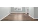 Bright room featuring stylish vinyl flooring and large window at 913 64Th W St, Bradenton, FL 34209