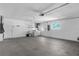 Spacious garage featuring a utility sink and washer and dryer hookups at 913 64Th W St, Bradenton, FL 34209