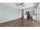 Open living room and kitchen features hardwood floors and recessed lighting at 913 64Th W St, Bradenton, FL 34209