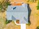 Aerial view showcases deck and roof of the home at 10001 289Th E St, Myakka City, FL 34251