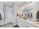 Bathroom featuring double vanity and shaker cabinets at 1017 Fernleaf Run, Bradenton, FL 34212
