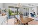 Dining area with view of the lake at 1017 Fernleaf Run, Bradenton, FL 34212