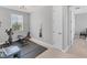 This light and airy exercise room includes a stationary bike and weight bench at 1017 Fernleaf Run, Bradenton, FL 34212