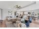 Open-concept living room flowing into dining and kitchen, perfect for entertaining at 1017 Fernleaf Run, Bradenton, FL 34212