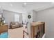 Comfortable loft area featuring a seating area and a view, perfect for relaxation at 1017 Fernleaf Run, Bradenton, FL 34212