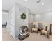 Relaxing loft with chairs and decor, ideal for reading, conversation or quiet time at 1017 Fernleaf Run, Bradenton, FL 34212