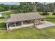 Picturesque outdoor pavilion featuring a barbecue area and seating, ideal for community events at 1017 Fernleaf Run, Bradenton, FL 34212