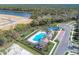 Overhead shot of community amenities including the pool, tennis and bocce ball courts at 12091 Firewheel Pl, Venice, FL 34293